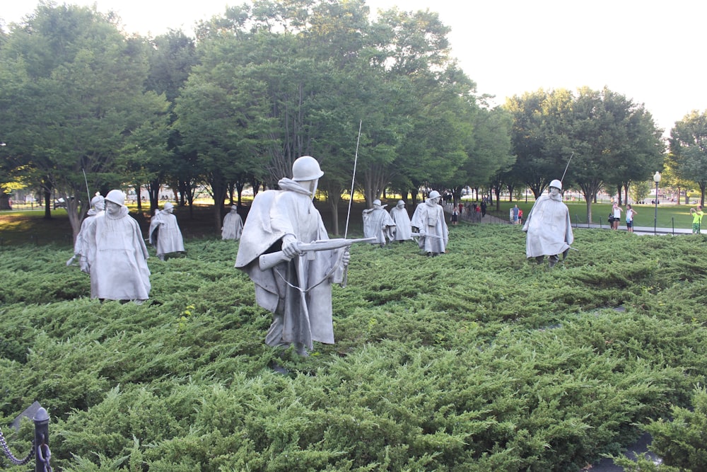 a group of people dressed as knights in a field