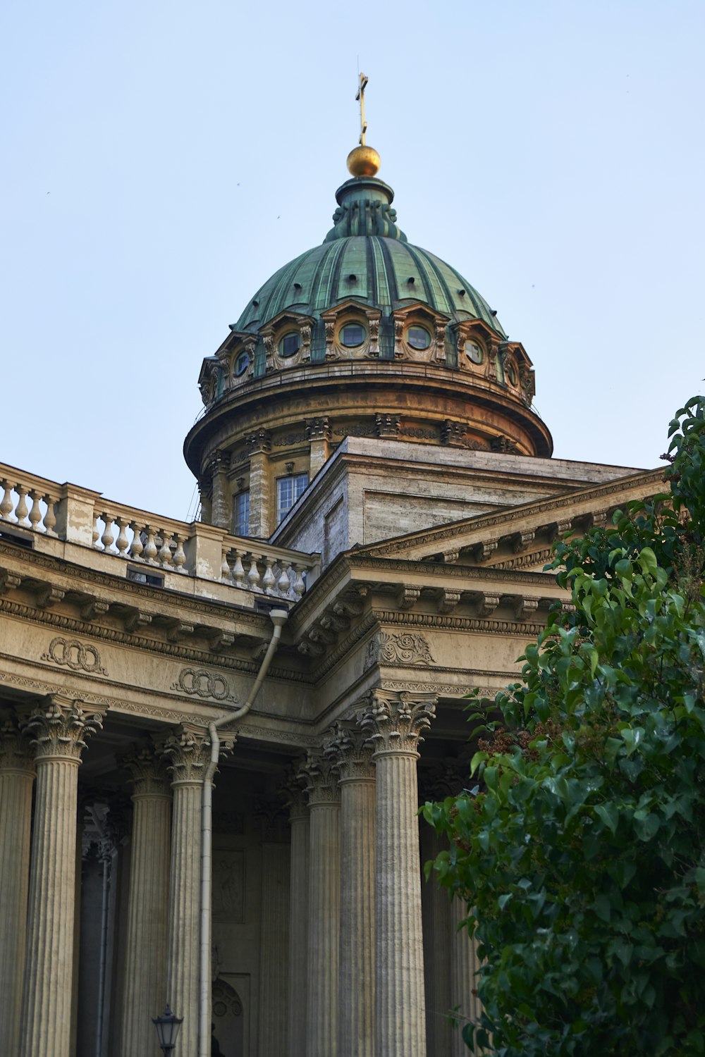 a building with columns and a dome on top
