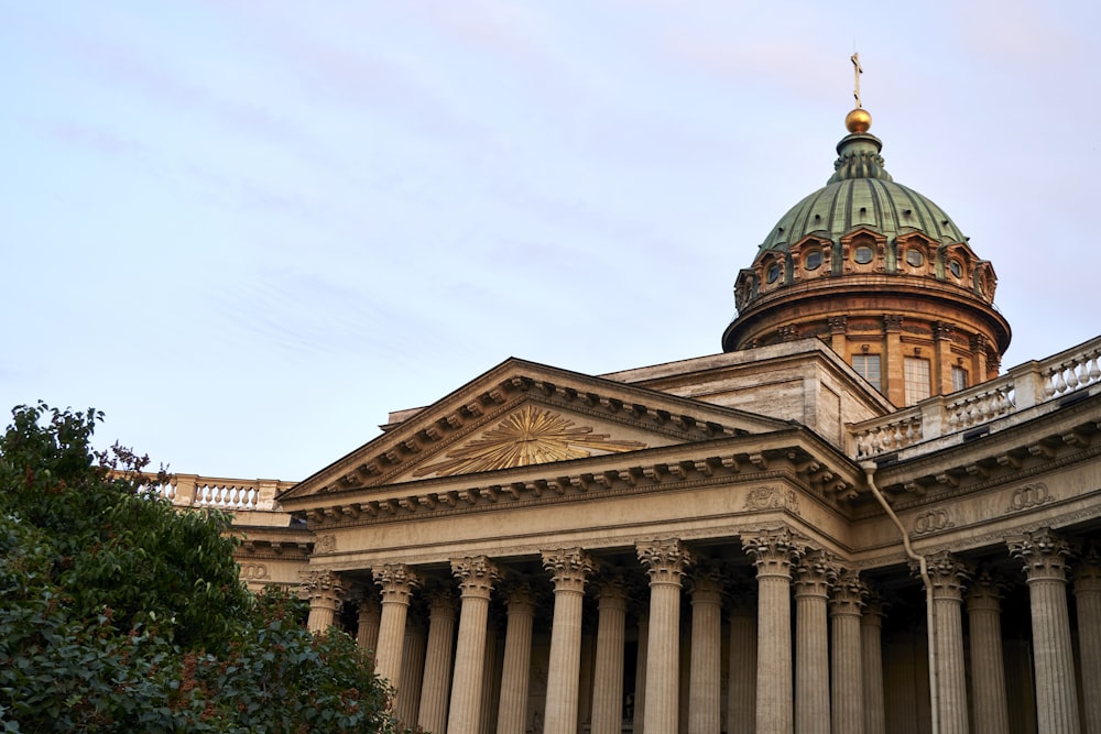 a building with columns and a dome on top