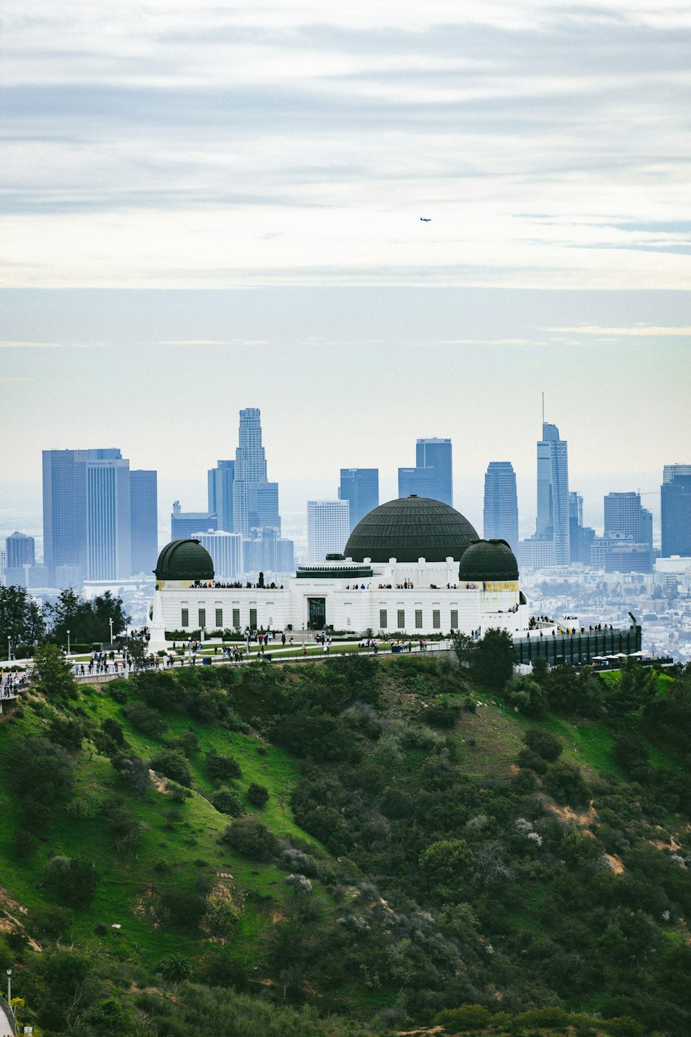 a view of a city from a hill