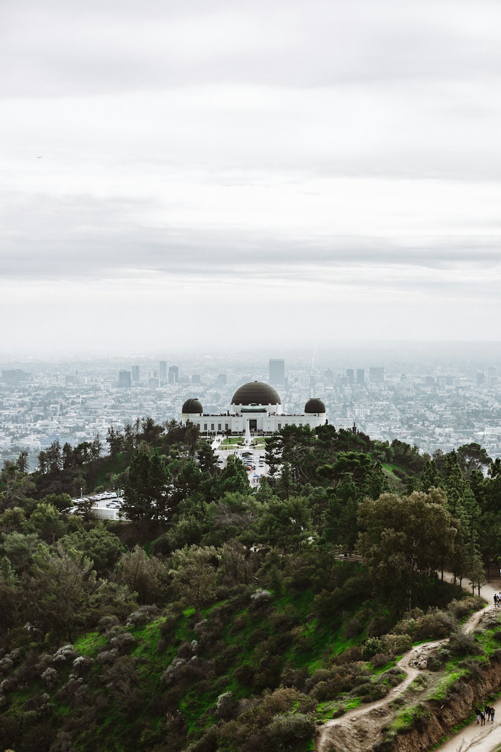 a view of a city from the top of a hill