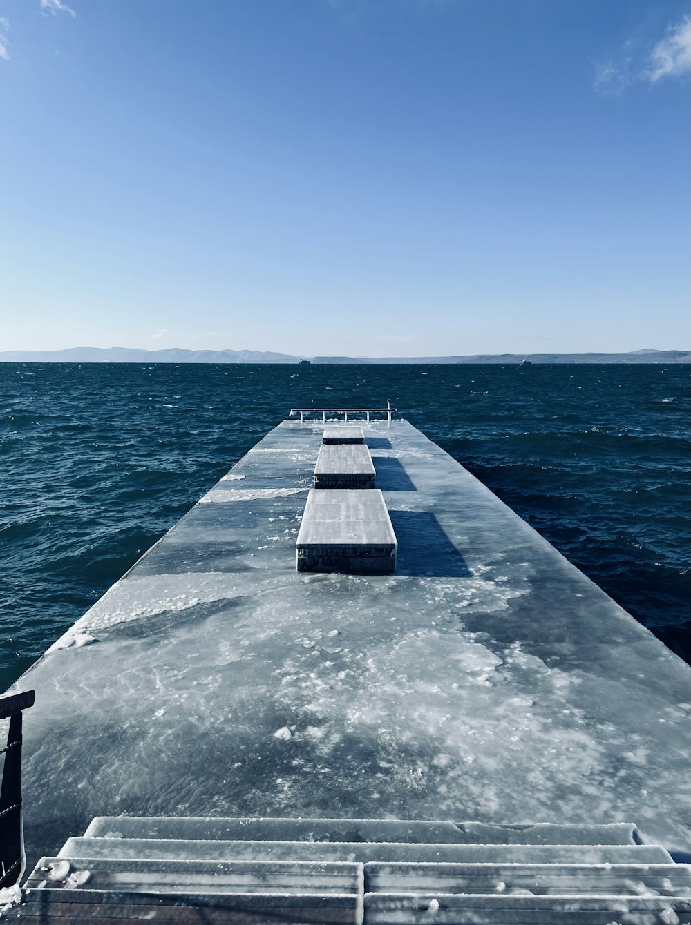 a boat traveling across a large body of water