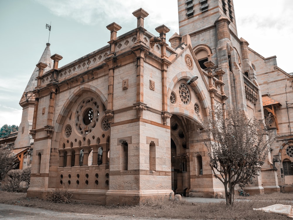 an old church with a clock tower on the front of it