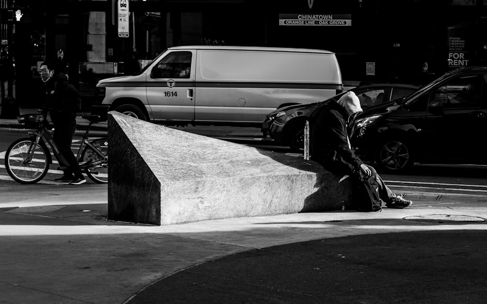 a black and white photo of a person on a skateboard