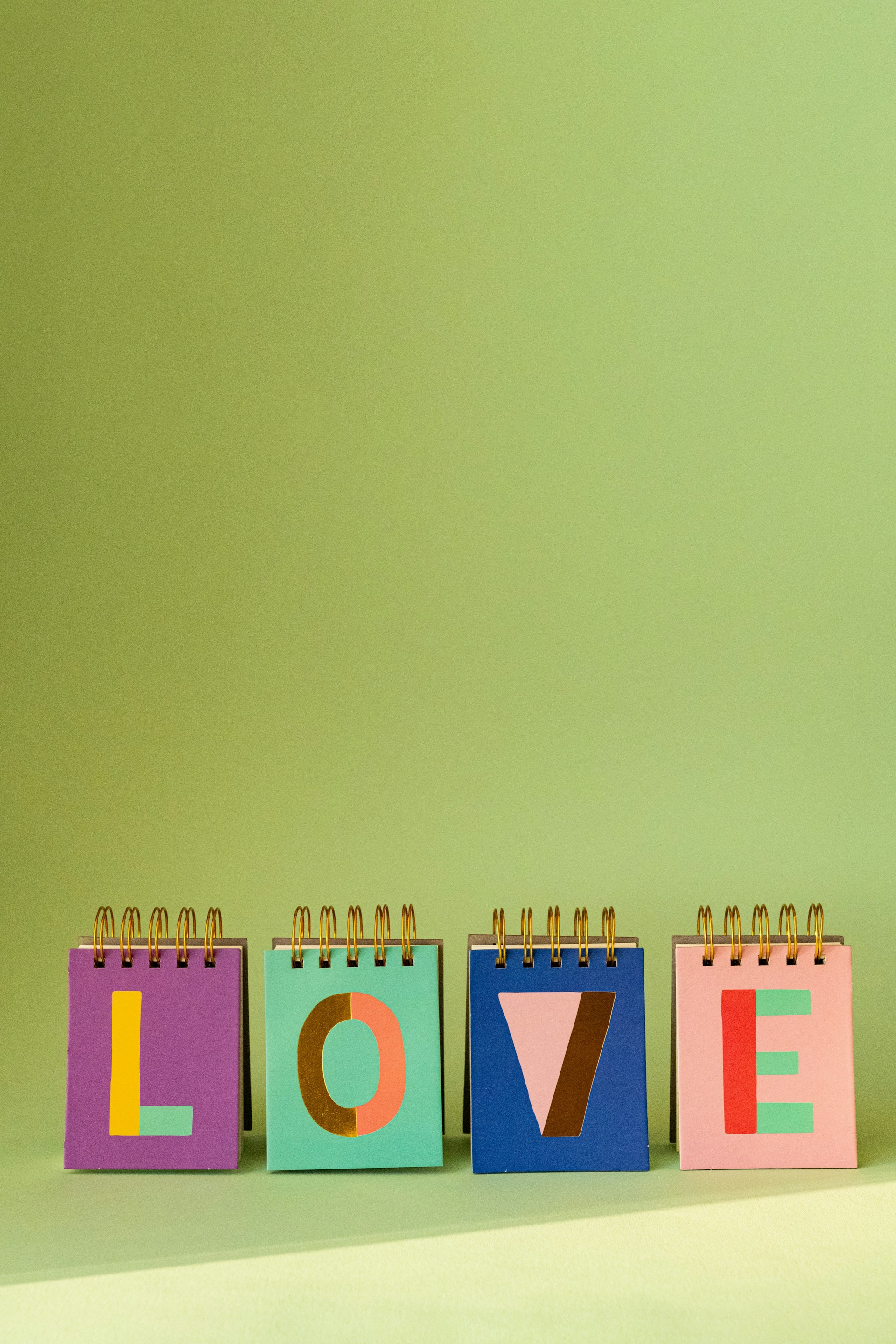 a colorful calendar with the word love spelled out