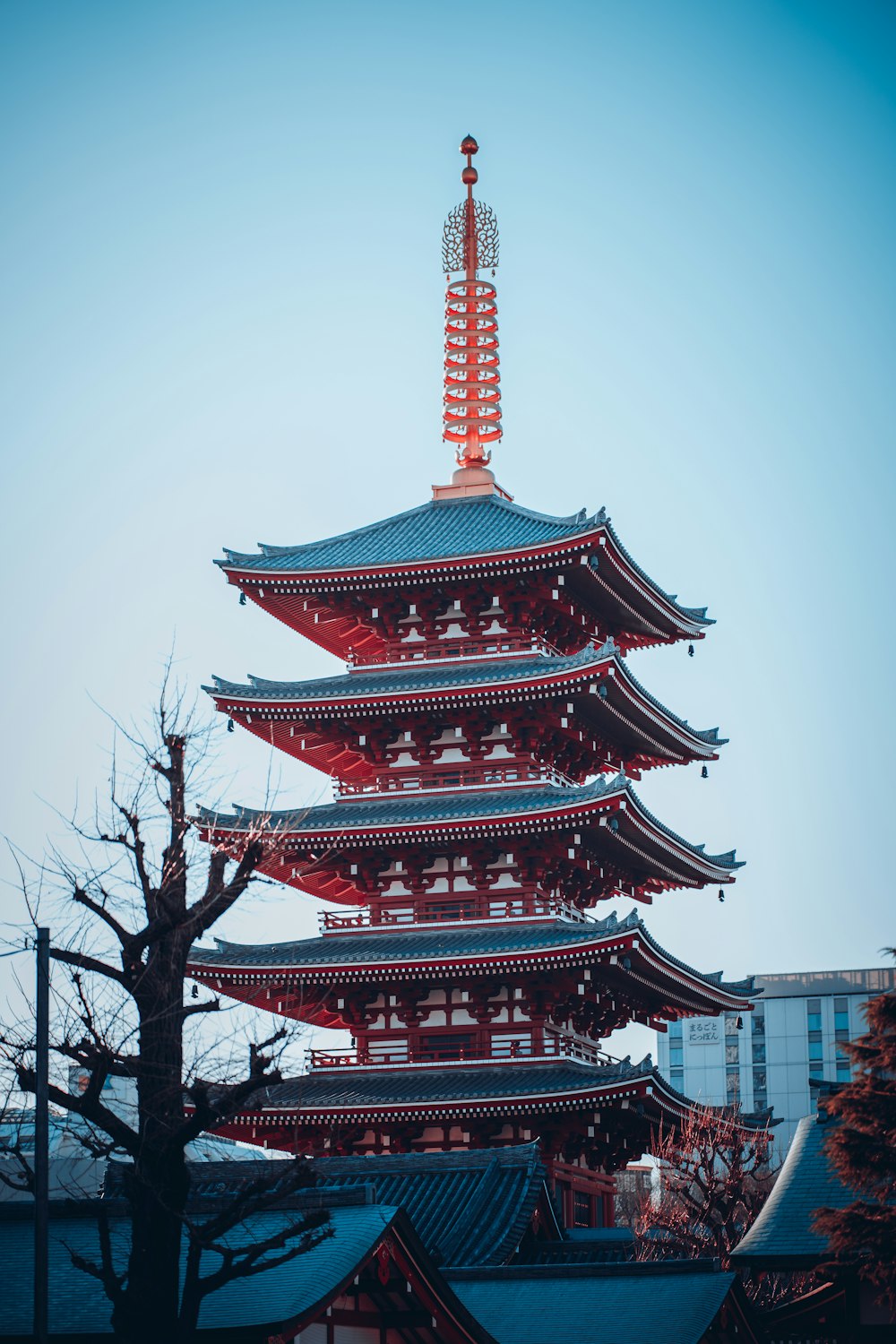 a tall building with a tower in the middle of it