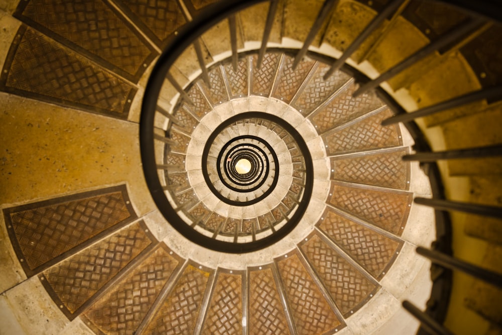 a spiral stair case in a building