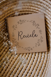 Notebook cover adorned with a subtle fable-inspired design from Raquel Beltrán’s universe