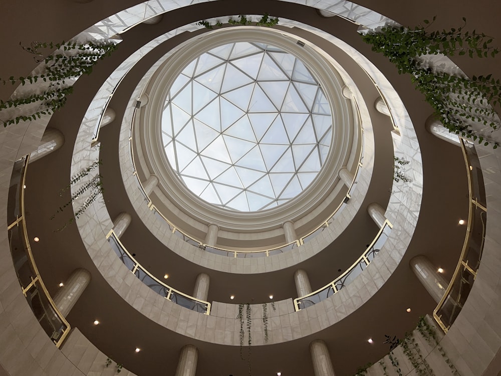 a large circular building with a skylight above it