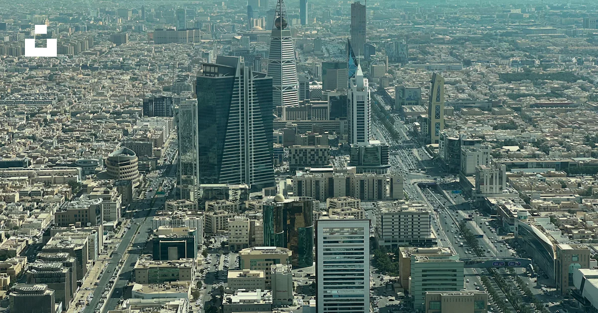 An aerial view of a city with tall buildings photo – Free Riyadh saudi ...