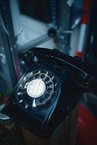 A close-up of a vintage phone with a softly blurred background, symbolizing easy contact.