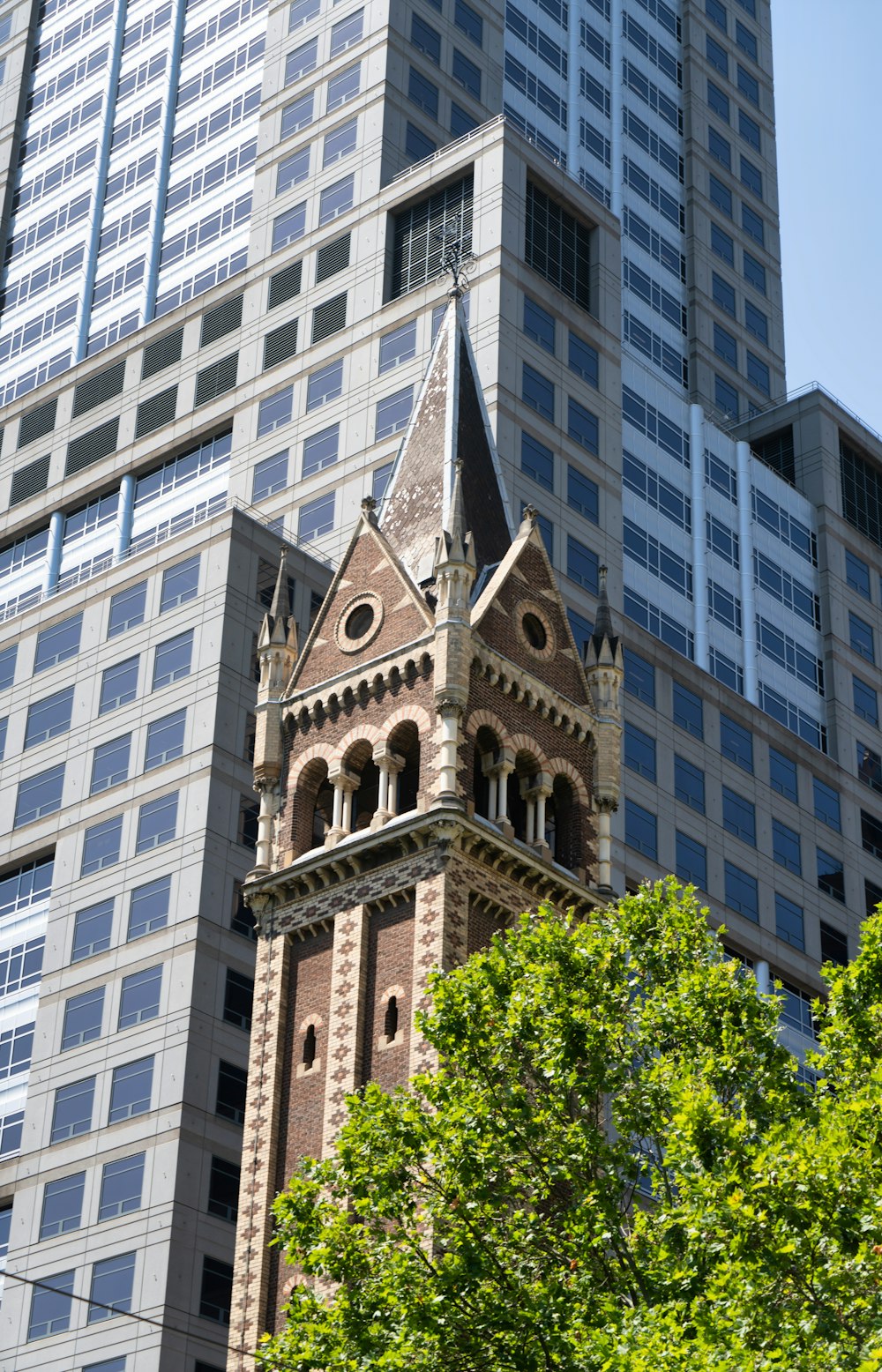 a tall building with a clock on the front of it