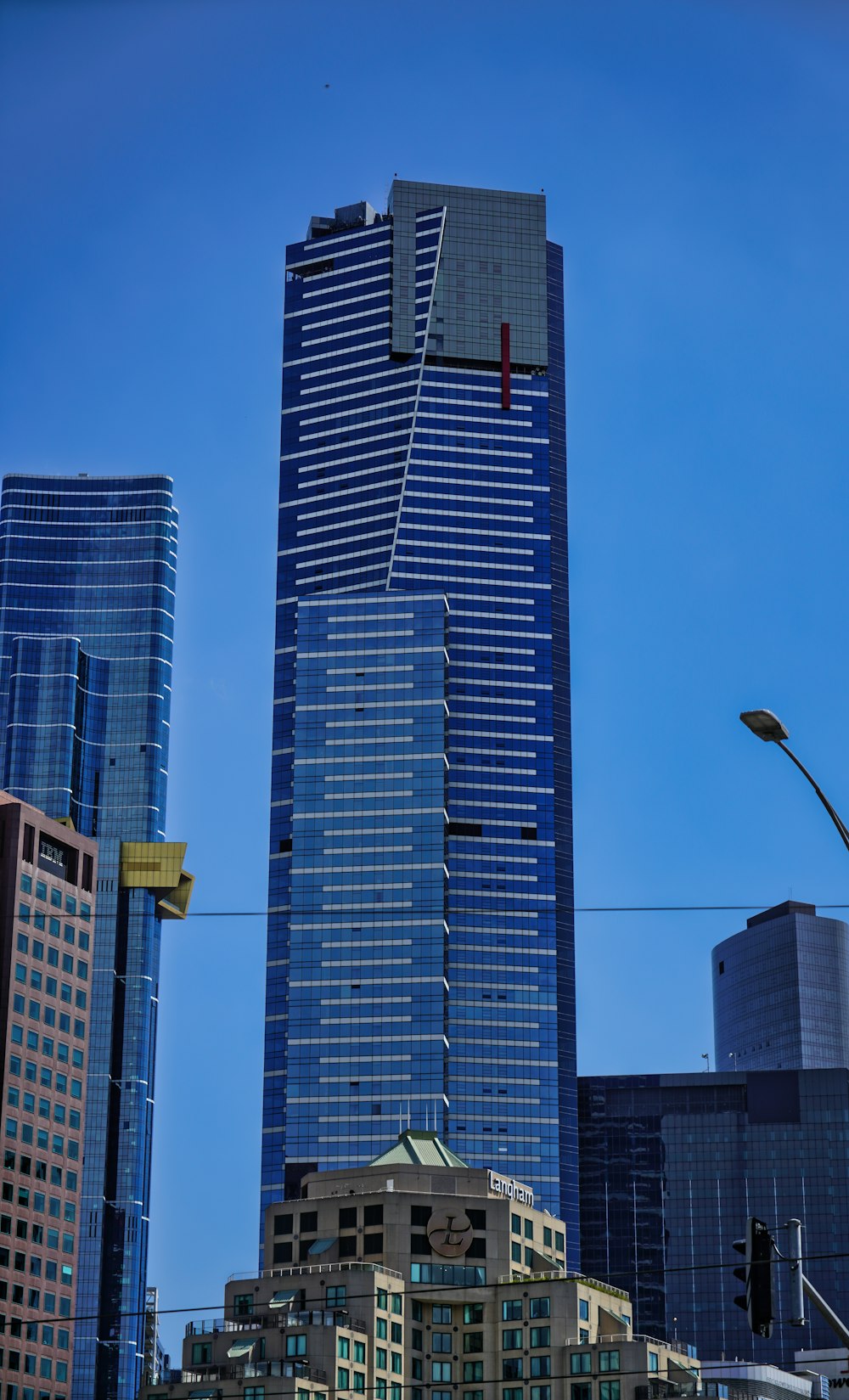 a very tall building in the middle of a city