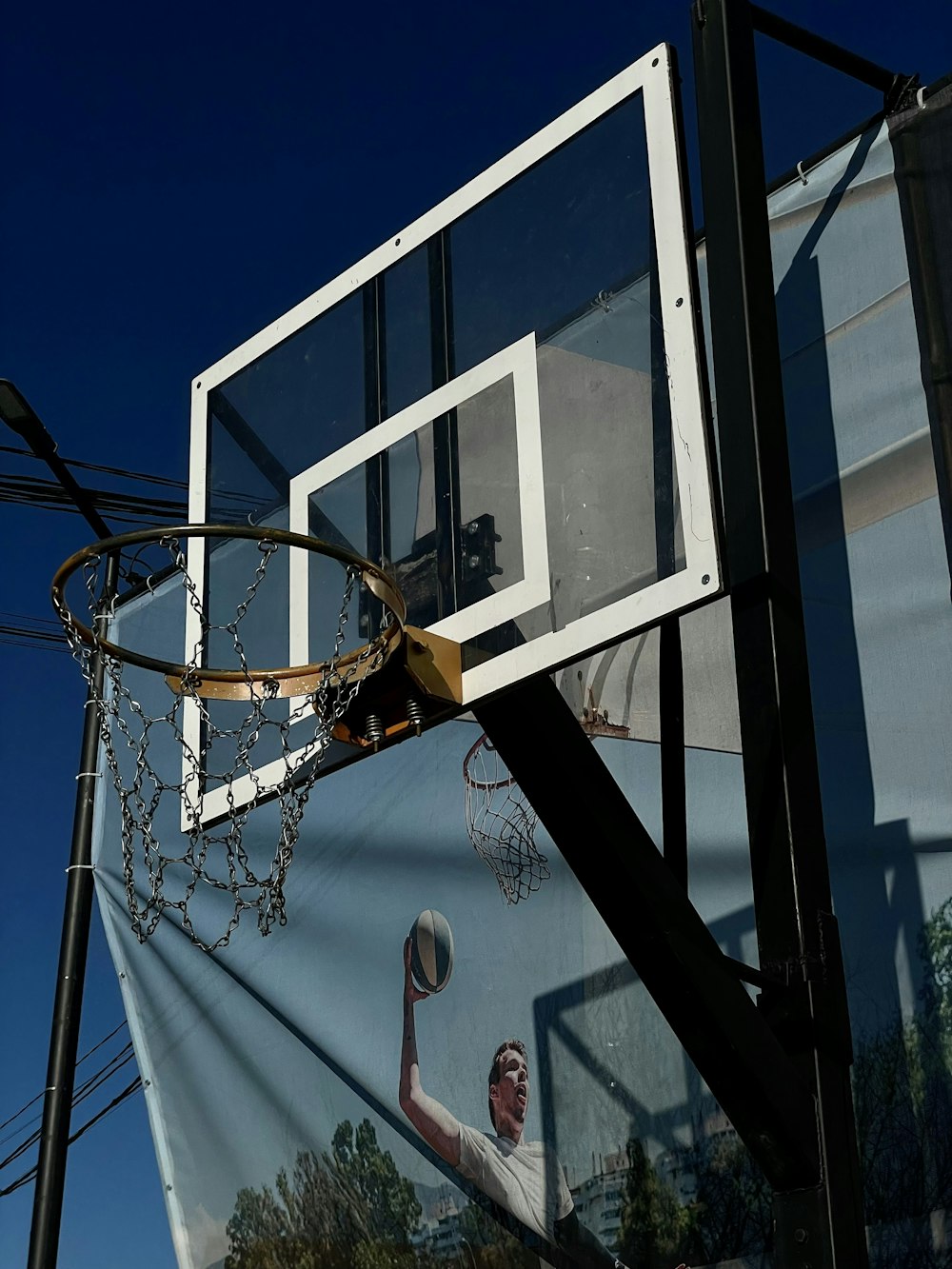 a basketball hoop with a picture of a basketball player on it