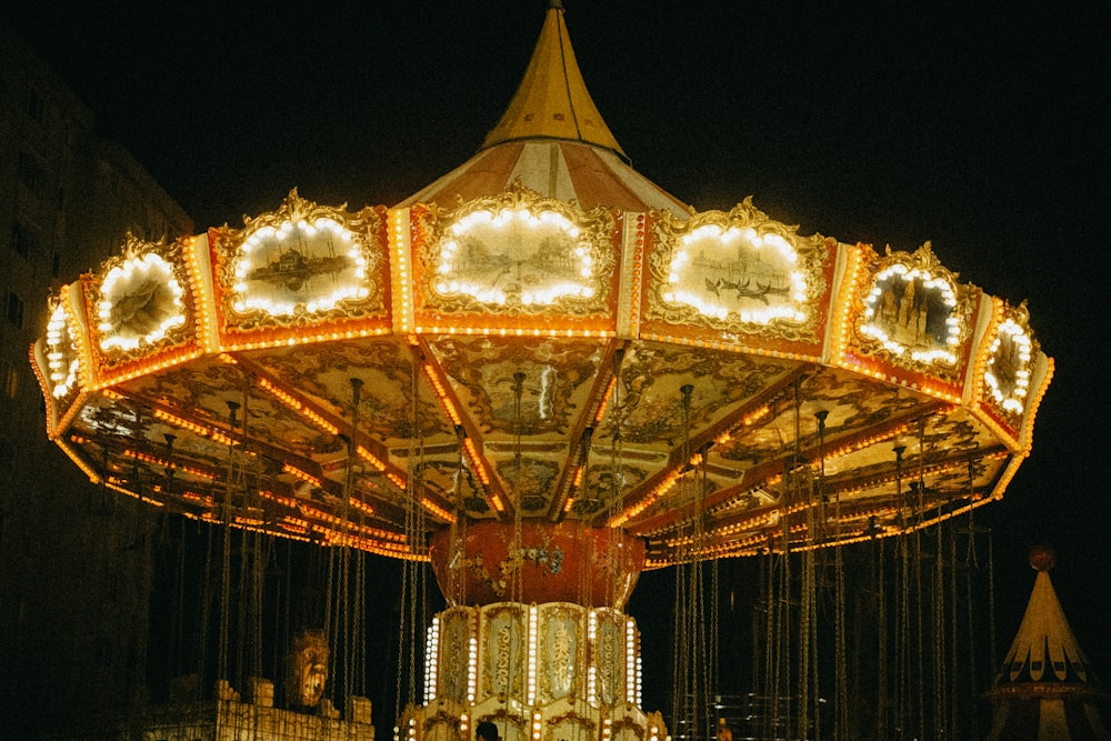 a merry go round at night with lights