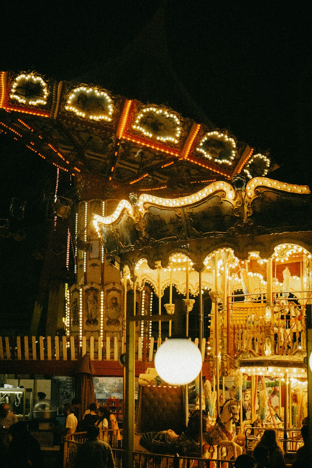 a merry go round at night with lights