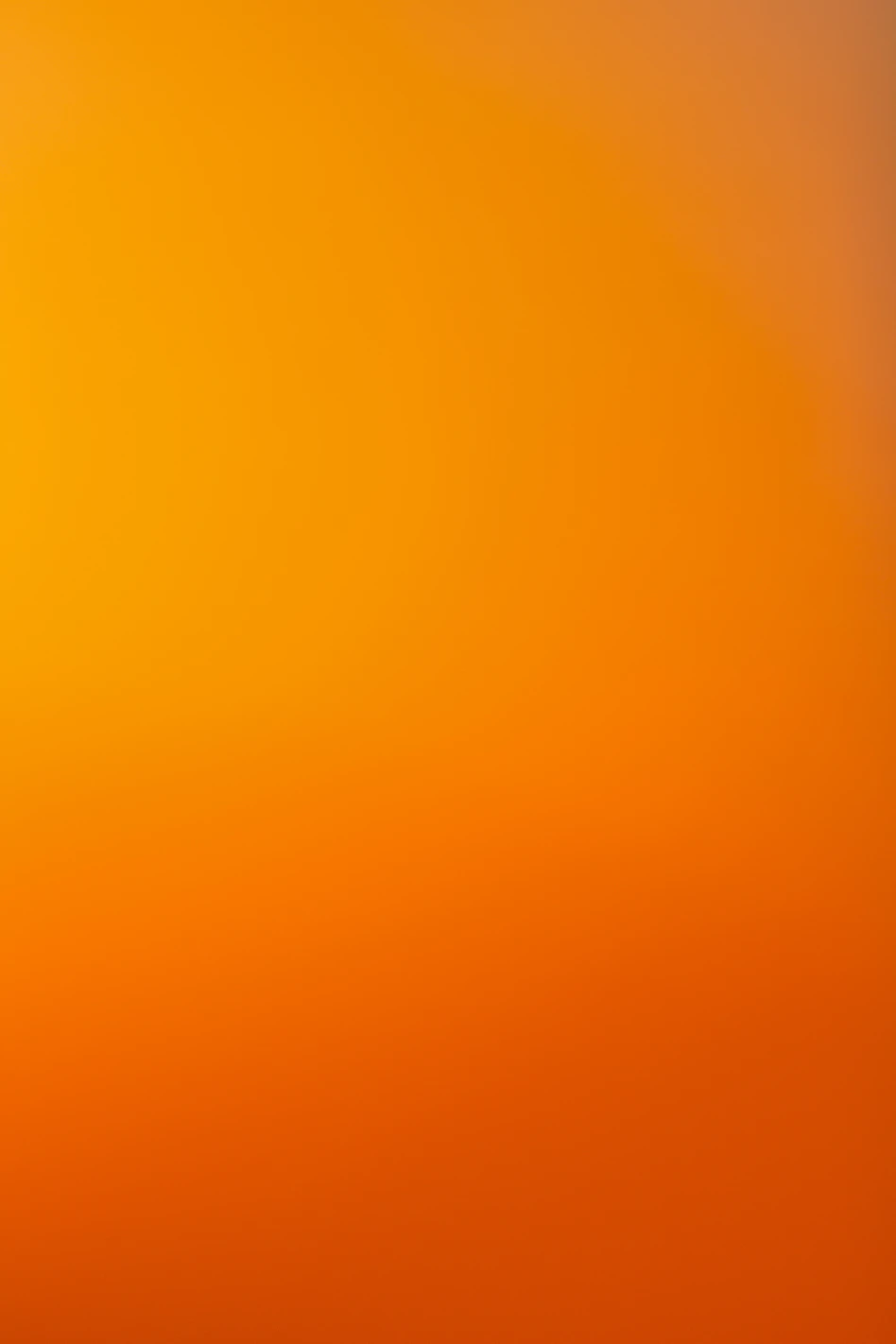 an airplane flying in the sky at sunset