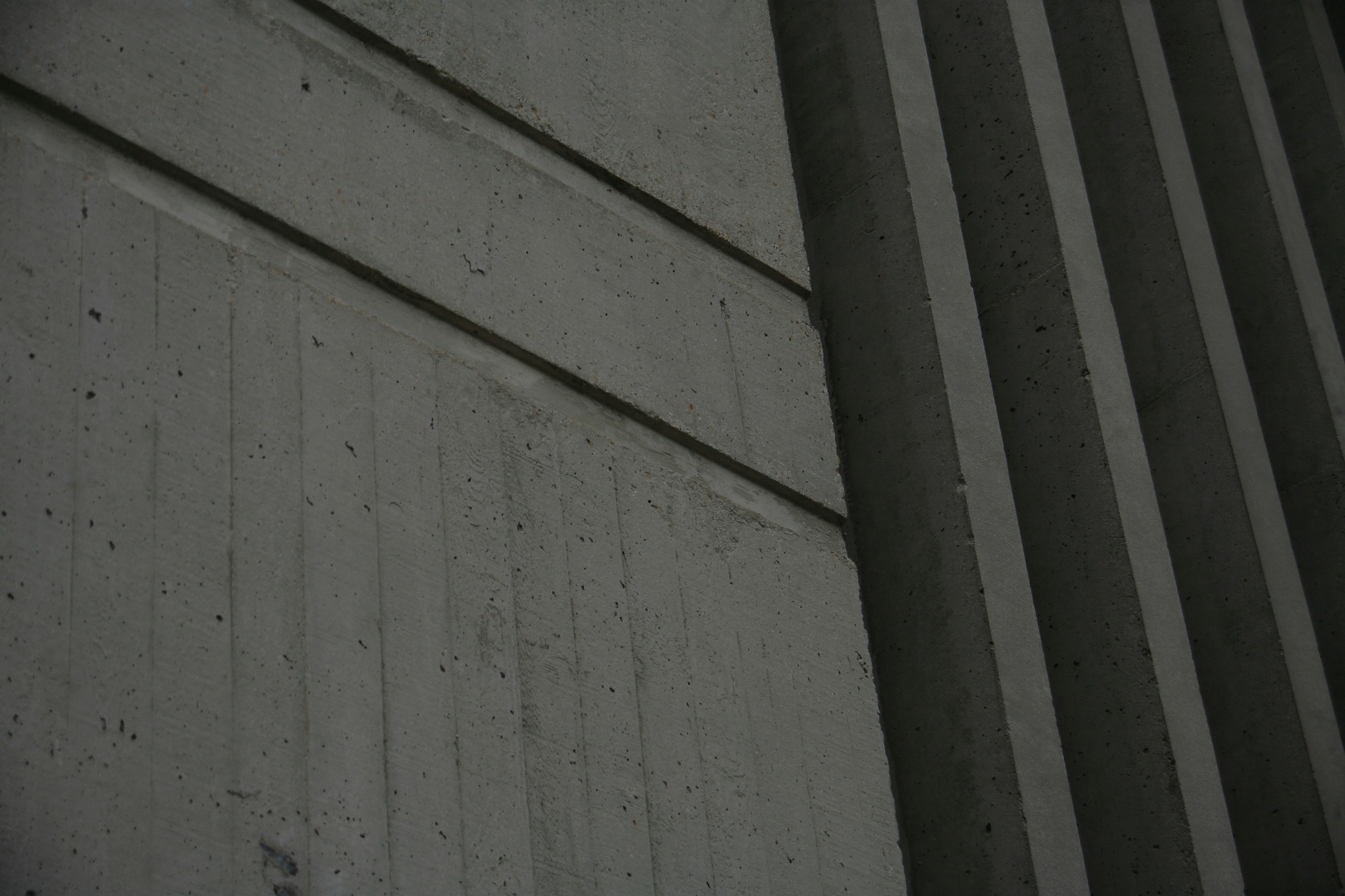 a stop sign on the side of a building