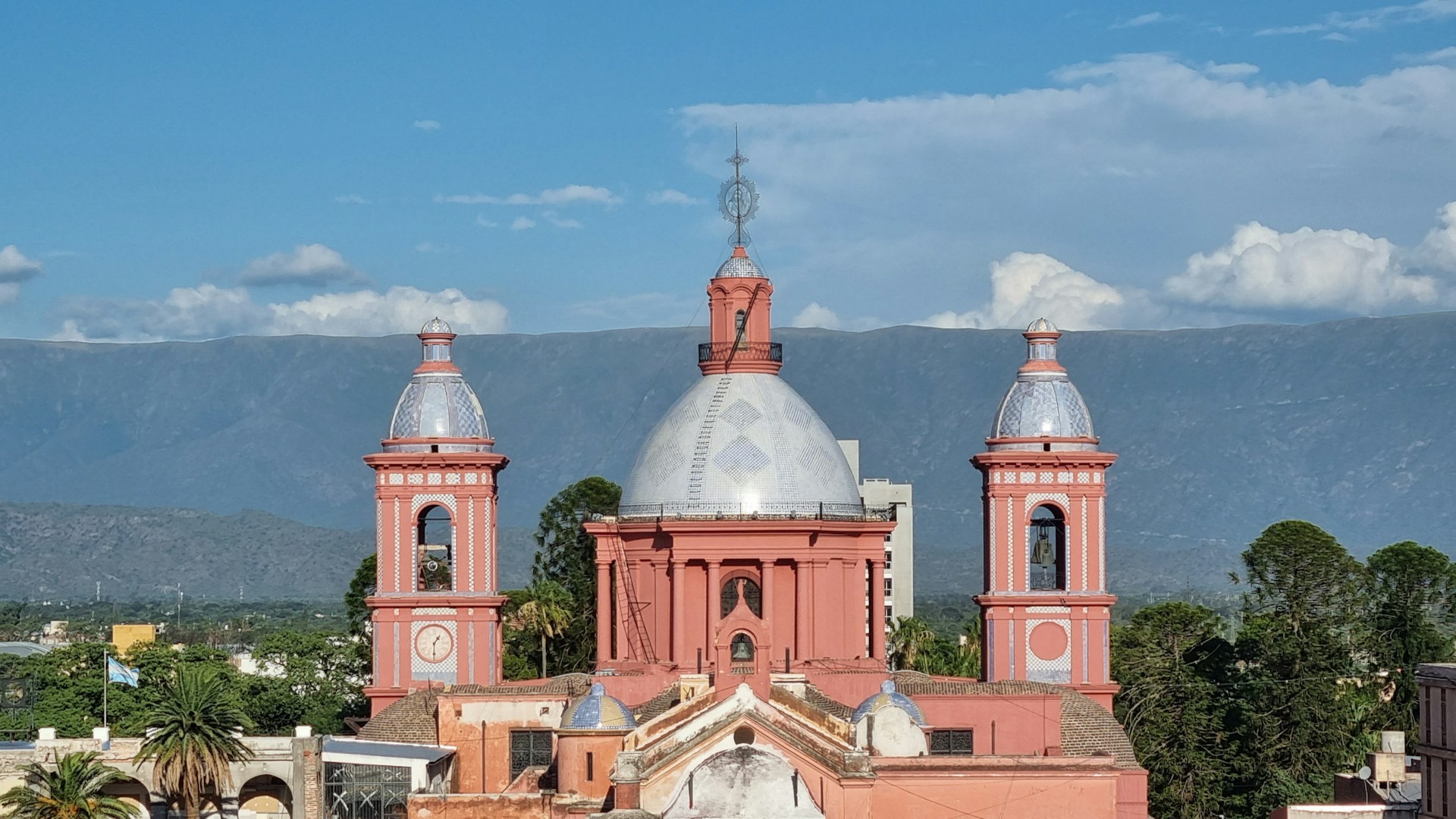 a large building with two towers and a dome