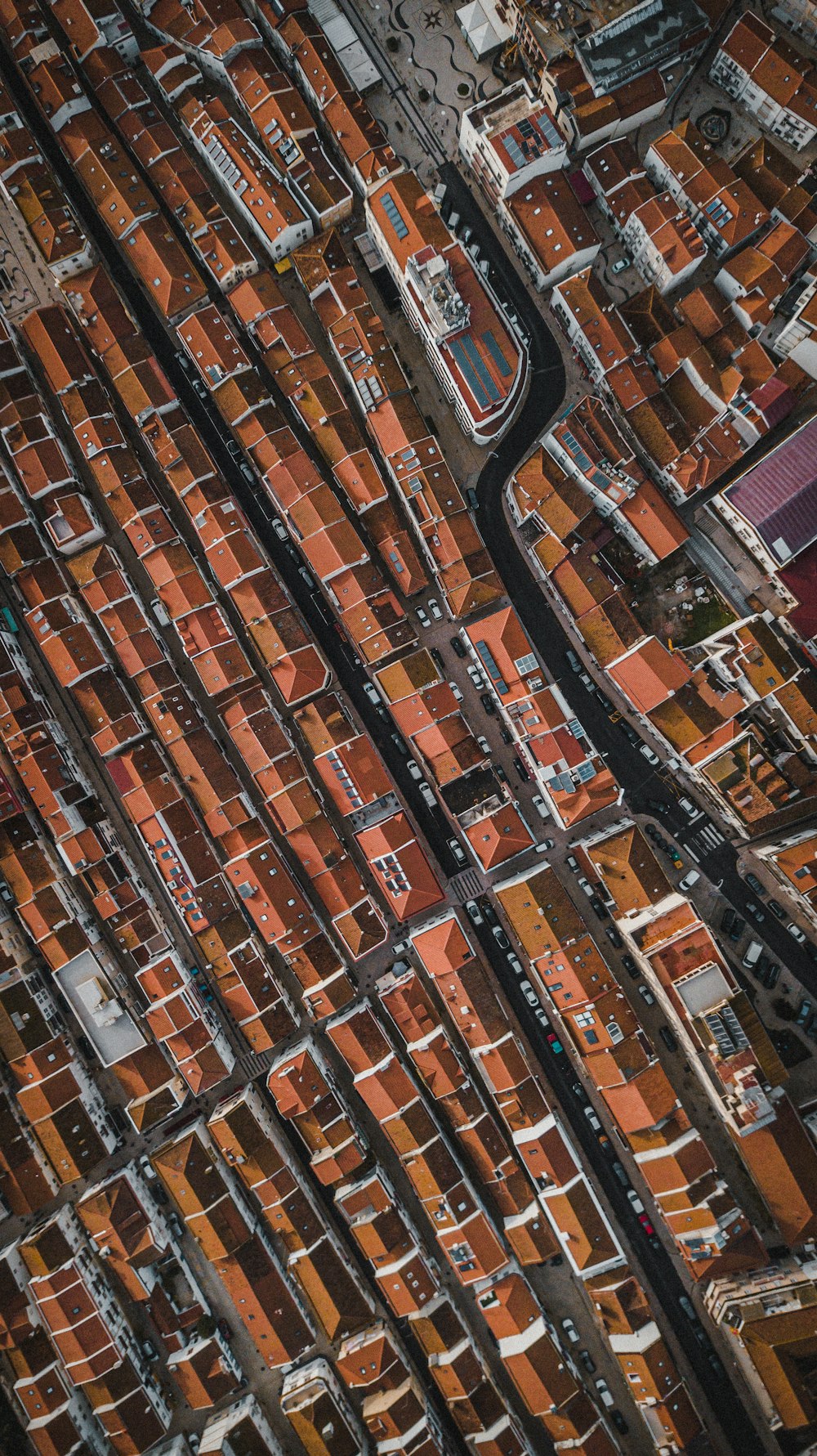 an aerial view of a city with lots of buildings