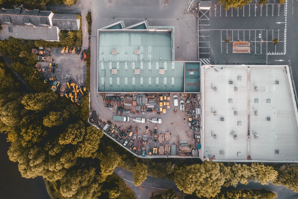 an aerial view of a building with a lot of construction equipment