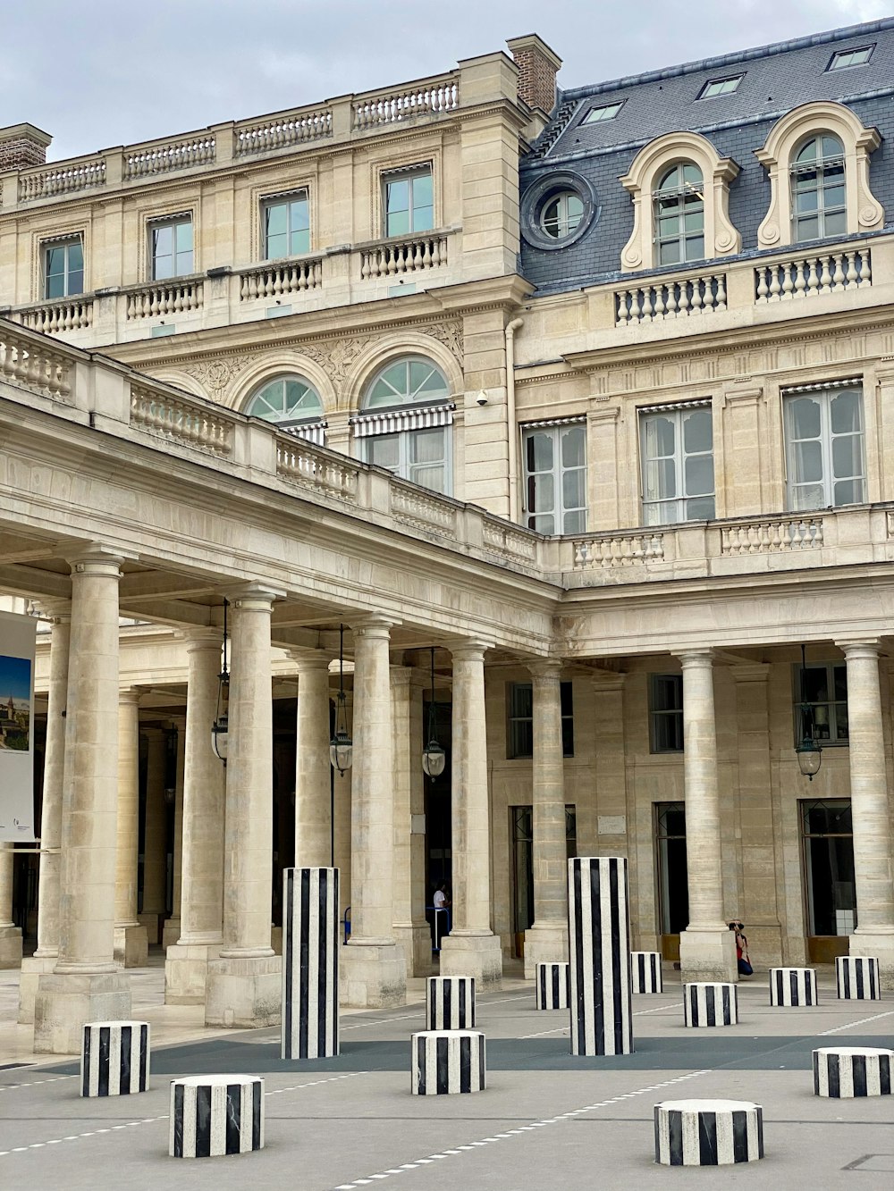 a large building with columns in front of it