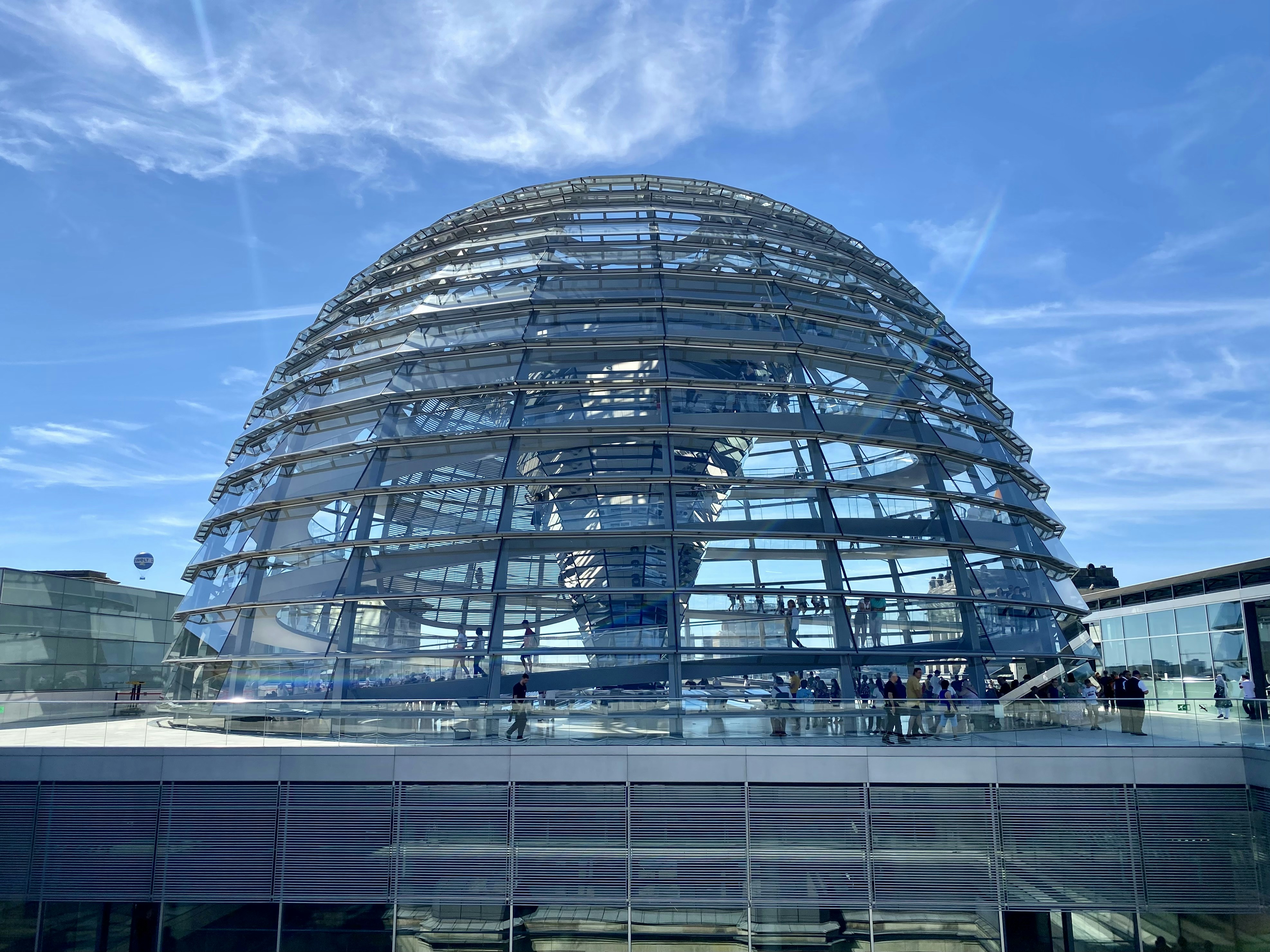 the dome of a building with a sky background