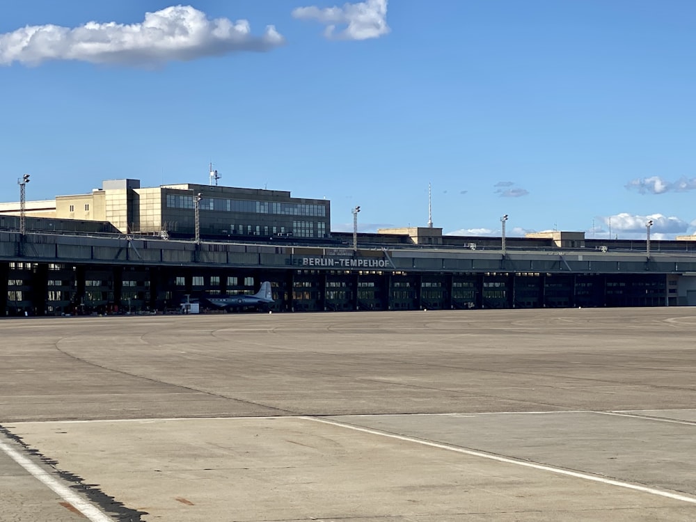 an airport with an airplane parked on the tarmac