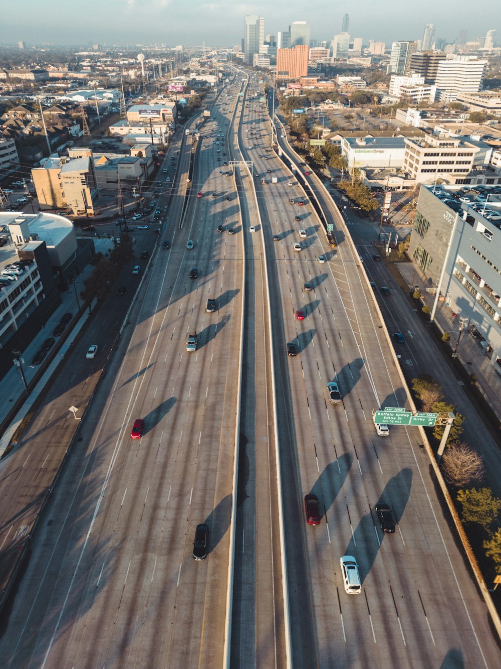 an aerial view of a highway in a city