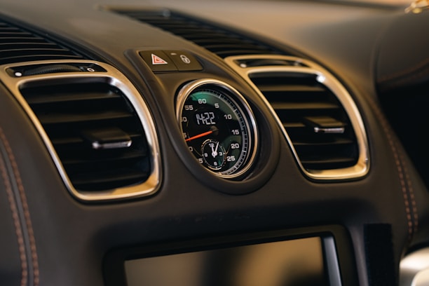 Close-up of a commercial vehicle dashboard with auction countdown timer visible.