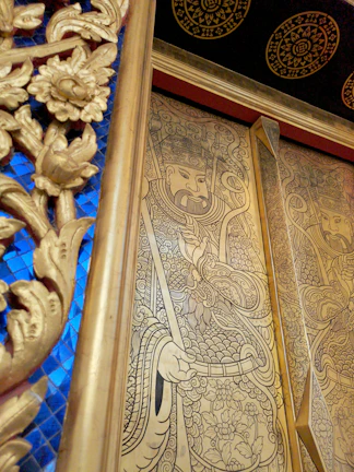A beautifully detailed jhaari ji with intricate carvings and vibrant colors.