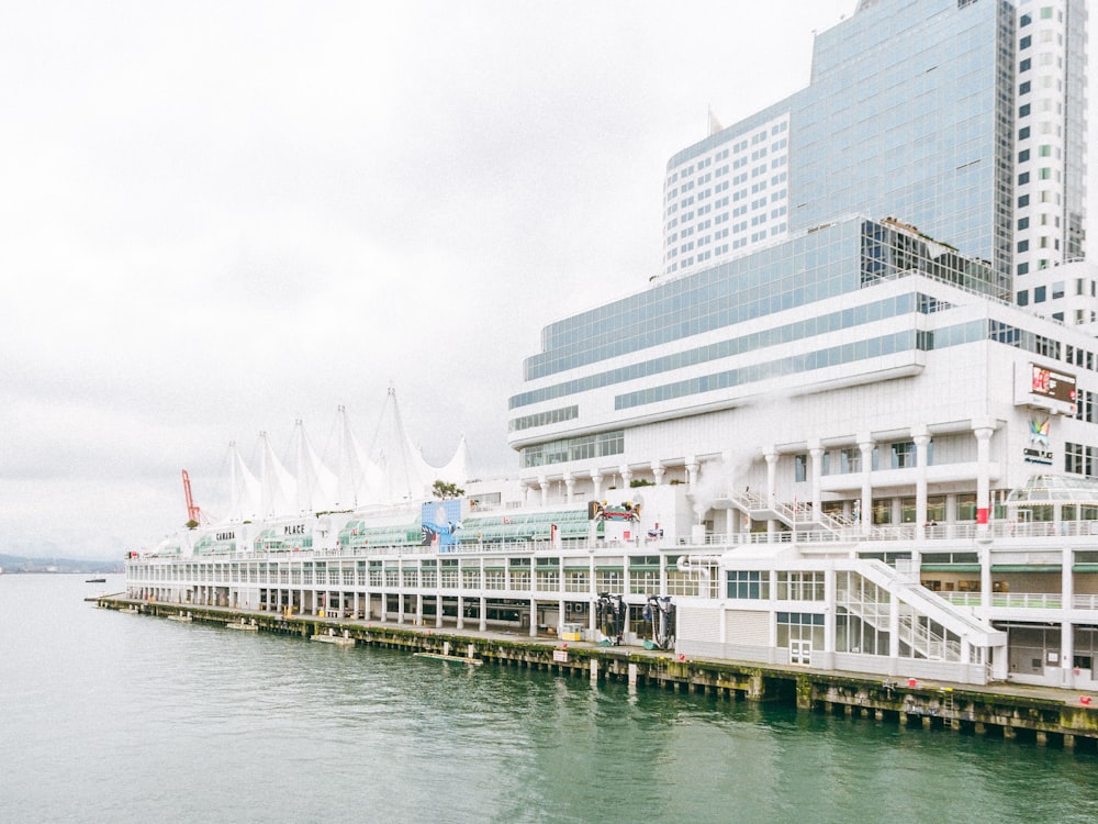 a long pier with a building in the background