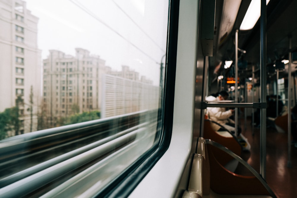 a view of a city from a train window