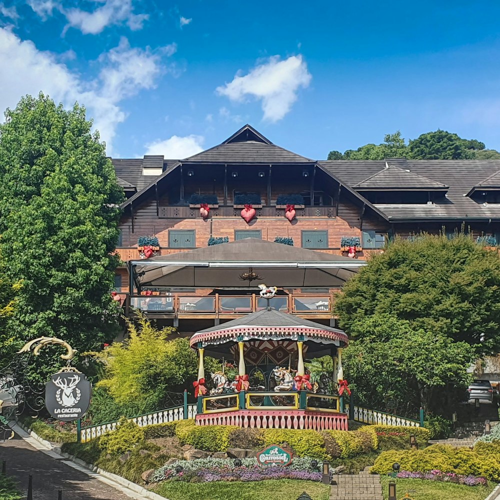 a large building with a gazebo in front of it