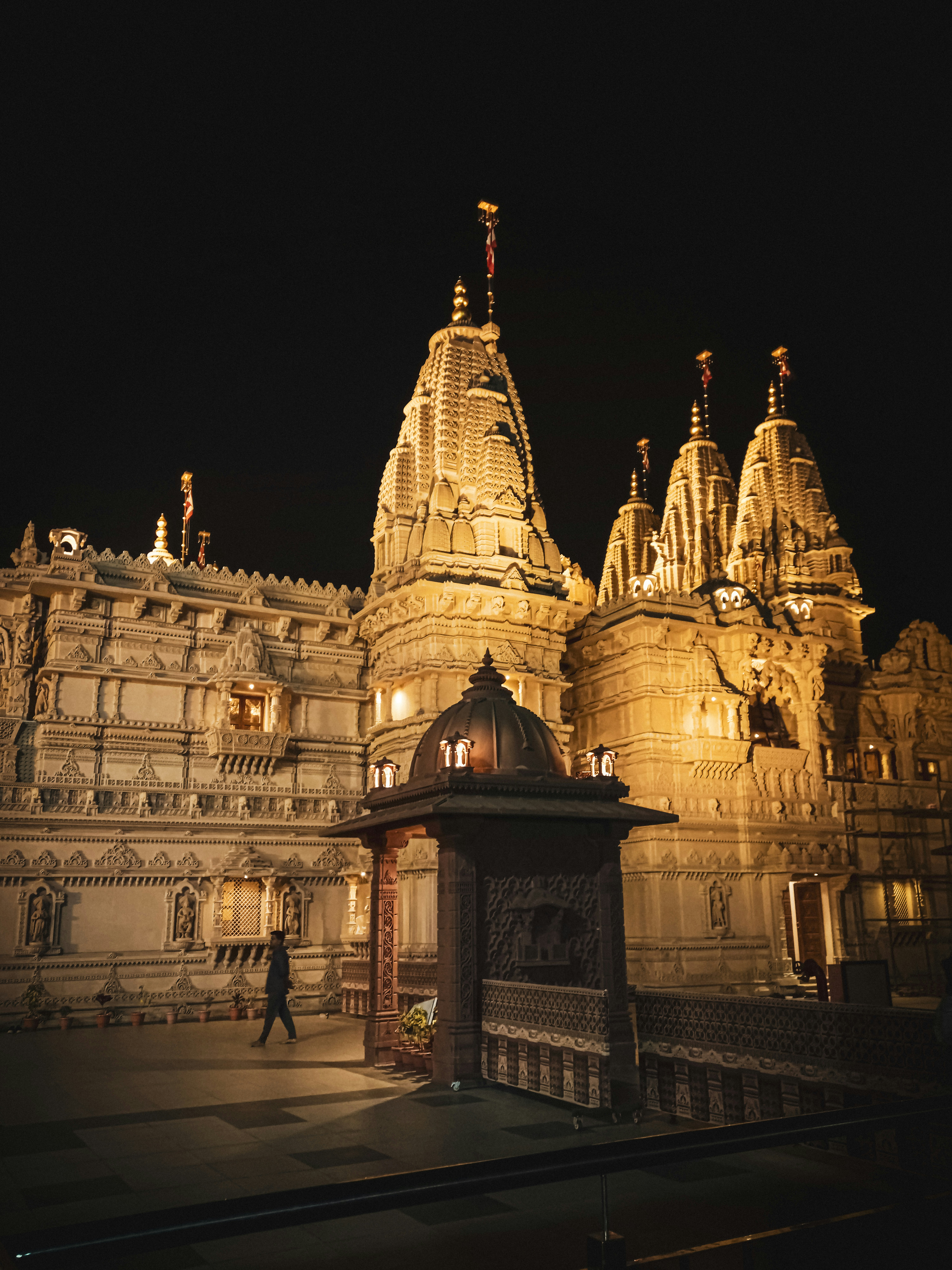 a very tall building with a clock on it's side