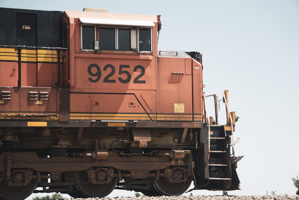 a train car sitting on top of a train track