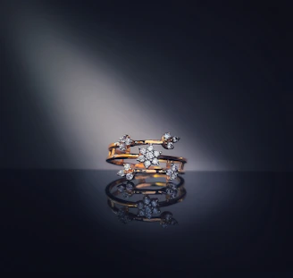 a couple of rings sitting on top of a table