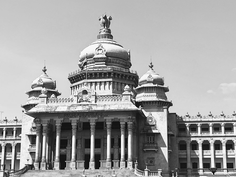 a black and white photo of a large building