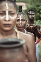 a group of people standing next to each other