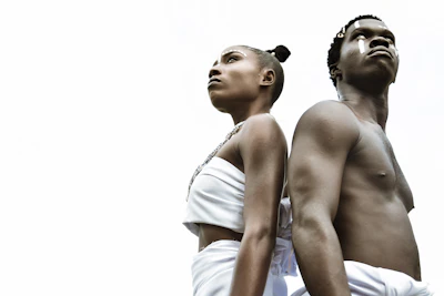 a man and a woman standing next to each other