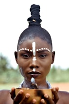 a woman with a nose ring and a nose ring on her head
