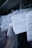 Several documents with Cyrillic text are visible, placed in a stack with clear plastic packaging around them. The focus is on a receipt or invoice in Russian, featuring printed and handwritten text.