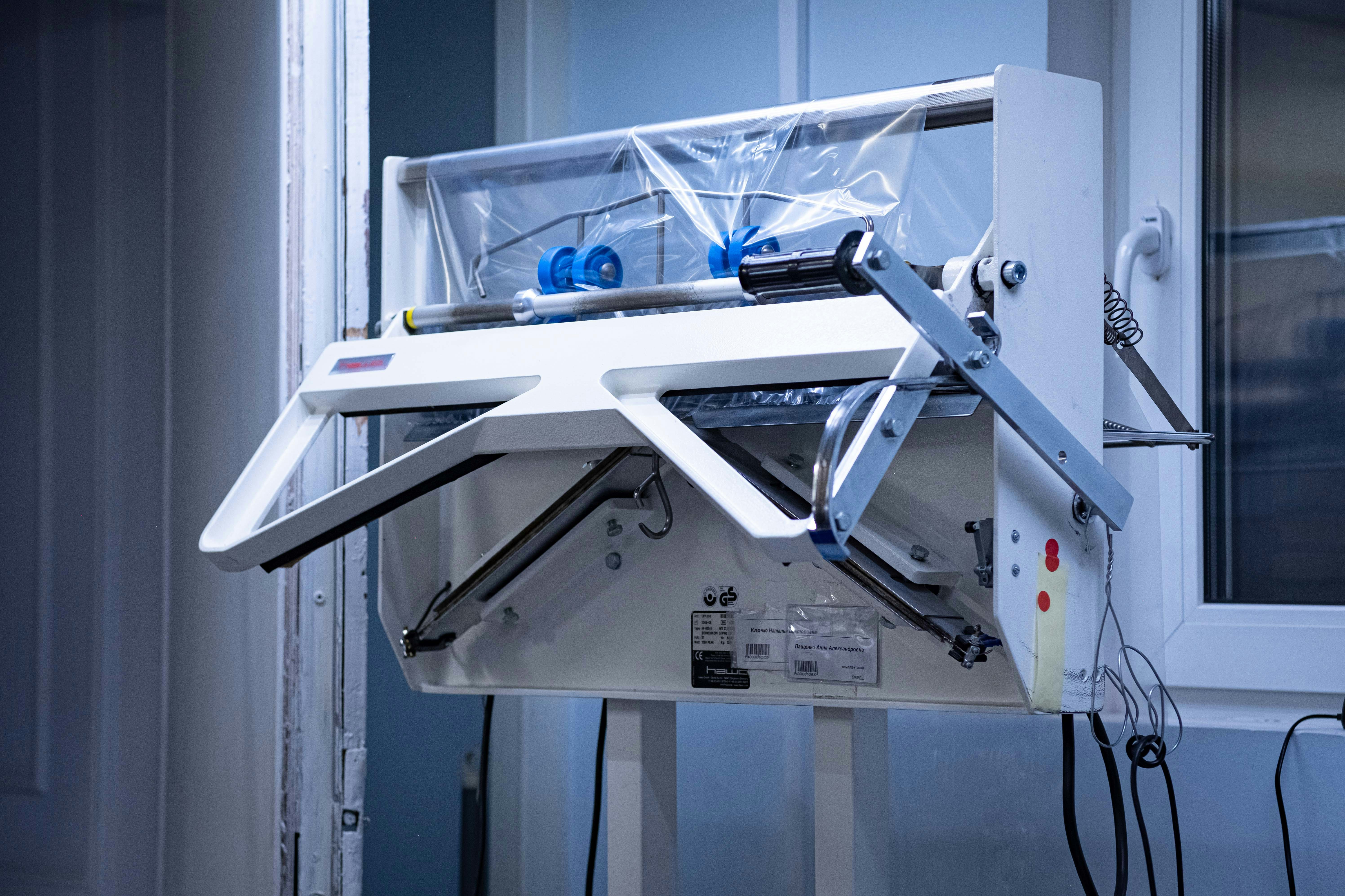 a machine that is sitting in front of a window