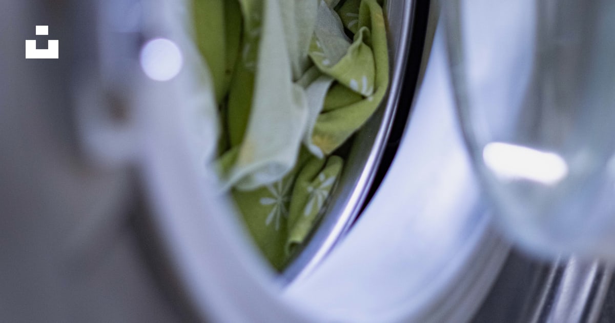A close up of a washing machine filled with water photo – Free Dry ...