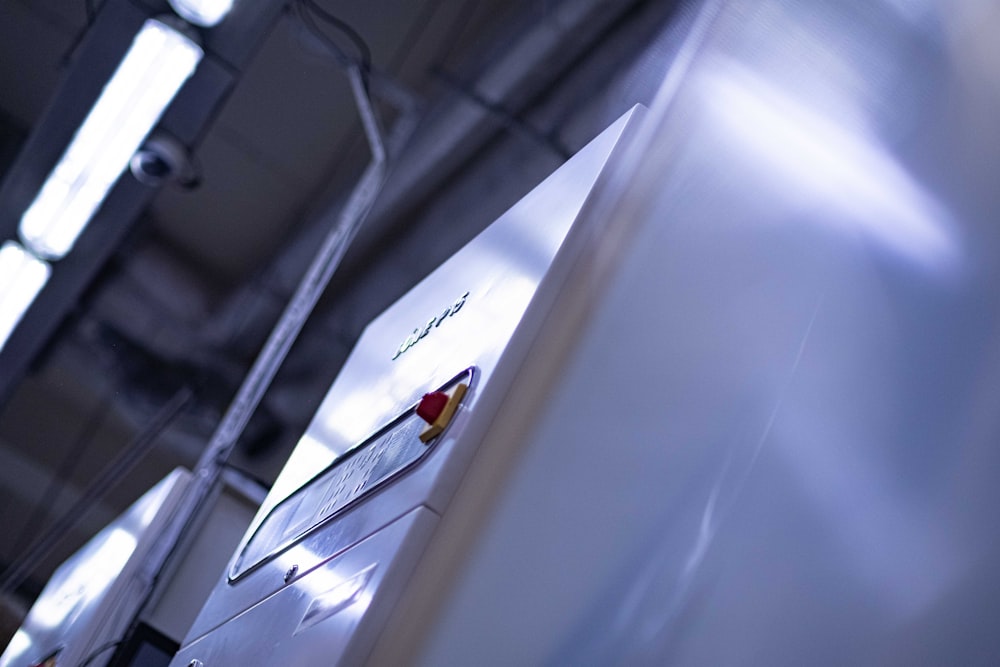 a close up of a white refrigerator in a kitchen