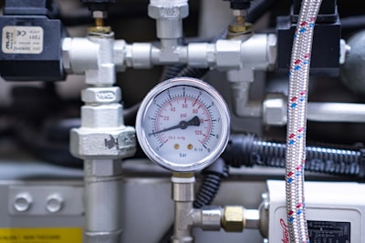 a close up of a pressure gauge on a machine