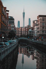 a body of water surrounded by tall buildings
