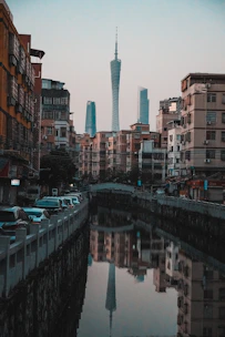 a body of water surrounded by tall buildings