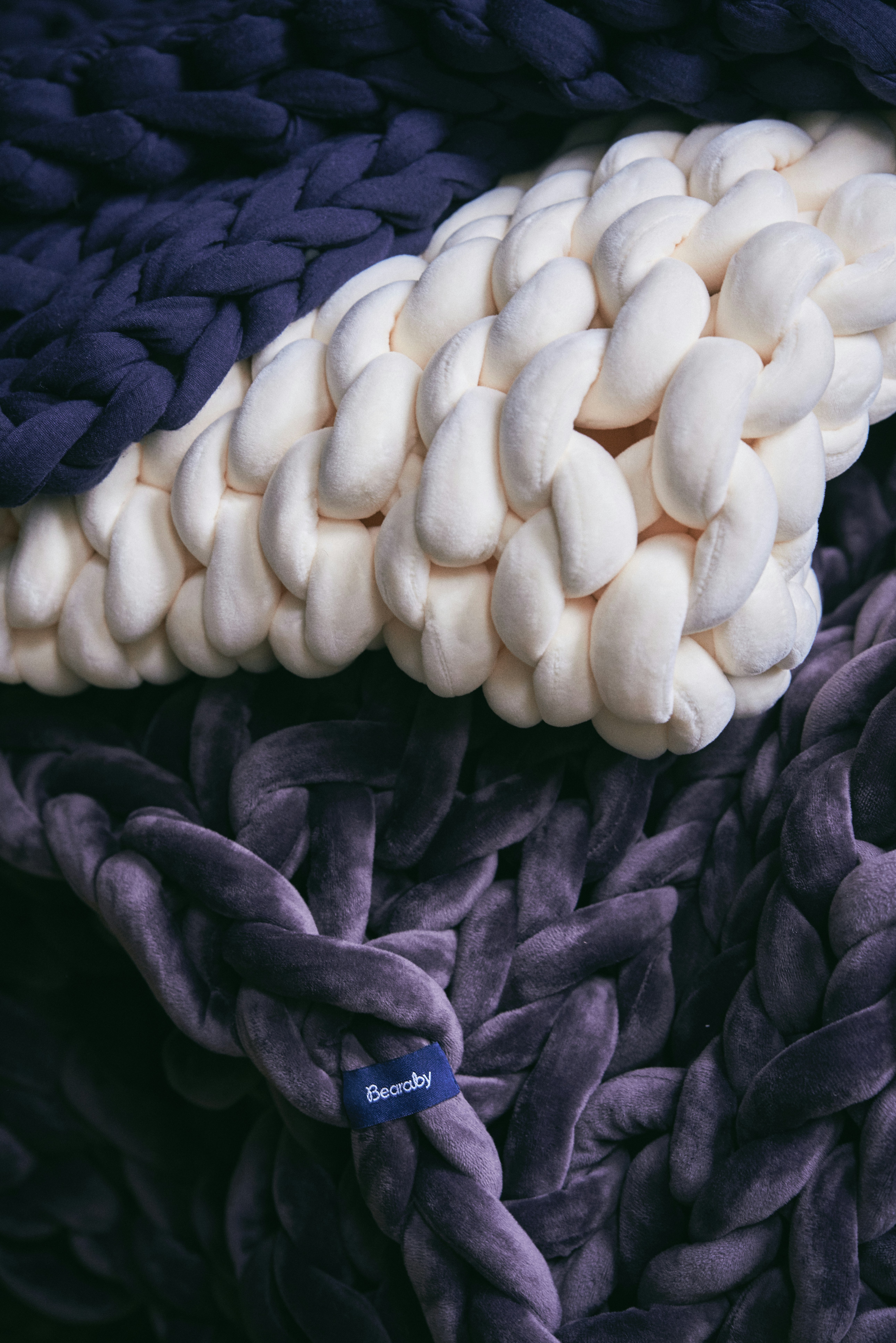A pile of marshmallows sitting on top of a blanket photo Free Knit