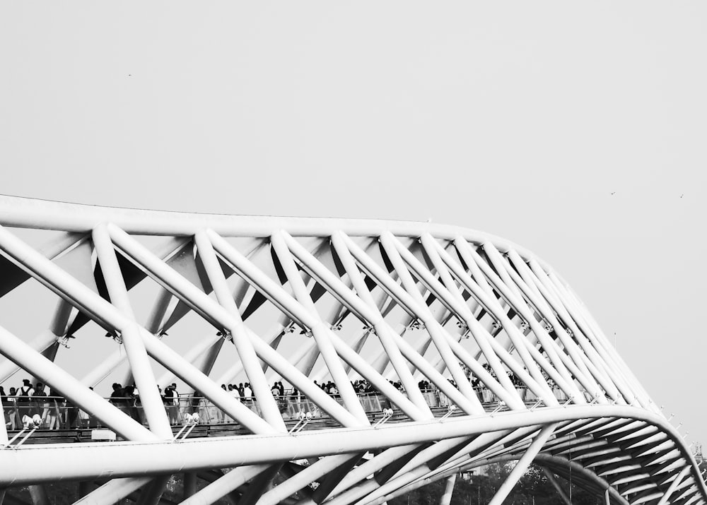 a black and white photo of a bridge